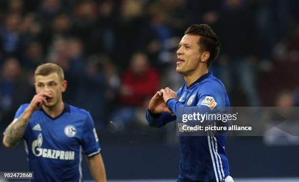 Schalke's Yevhen Konoplyanka and Max Meyer celebrate after the goal for 1:0 during the German Bundesliga football match between FC Schalke 04 and...