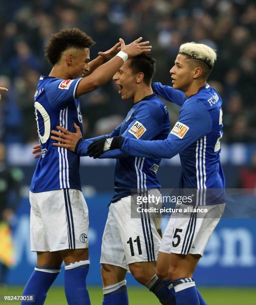 Schalke's Thilo Kehrer , Yevhen Konoplyanka and Amine Harit celebrate after the goal for 1:0 during the German Bundesliga football match between FC...