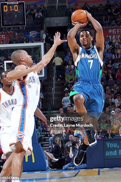 Ramon Sessions of the Minnesota Timberwolves shoots over Eric Maynor of the Oklahoma City Thunder on April 4, 2010 at the Ford Center in Oklahoma...