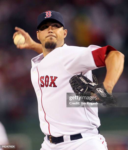 Josh Beckett of the Boston Red Sox pitches in the second inning against the New York Yankees on Opening Night at Fenway Park on April 4, 2010 in...