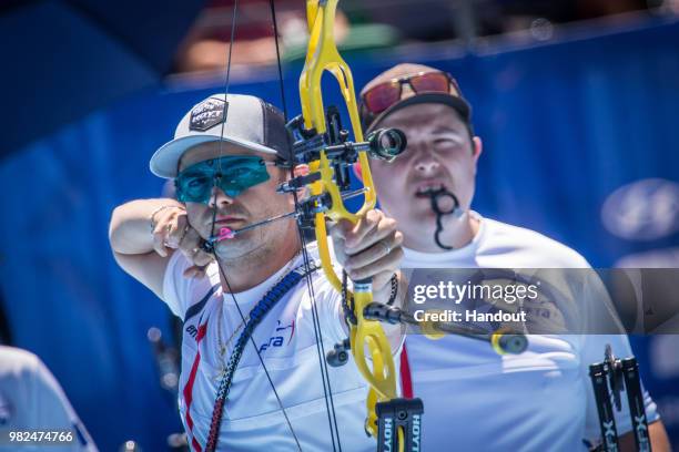 In this handout image provided by the World Archery Federation, Sebastien Peineau of France during the compound Men's team finals during the Hyundai...