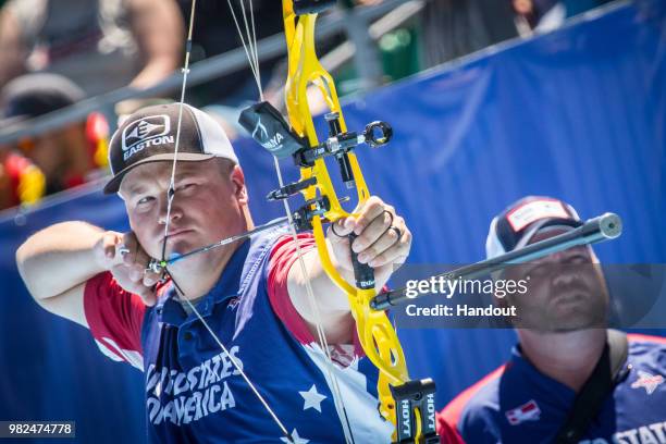 In this handout image provided by the World Archery Federation, Steve Anderson of USA during the compound Men's team finals during the Hyundai...