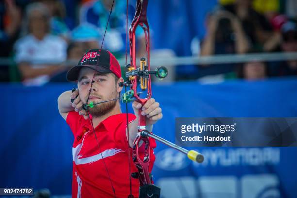 In this handout image provided by the World Archery Federation, Stephan Hansen of Denmark during the compound Men's finals during the Hyundai Archery...