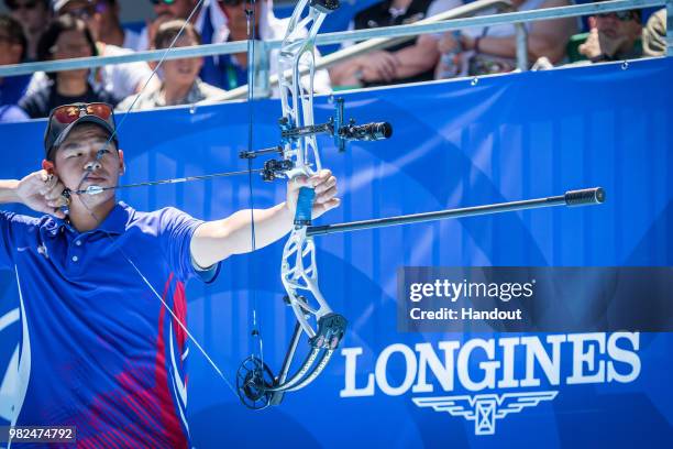 In this handout image provided by the World Archery Federation, Lin Che Wei of Chinese Taipei during the compound Men's team finals during the...