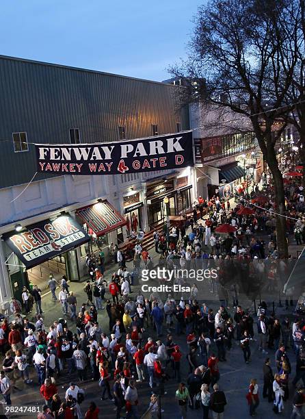 Fans stroll into the ballpark before the start of the game between the Boston Red Sox and the New York Yankees on April 4, 2010 during Opening Night...