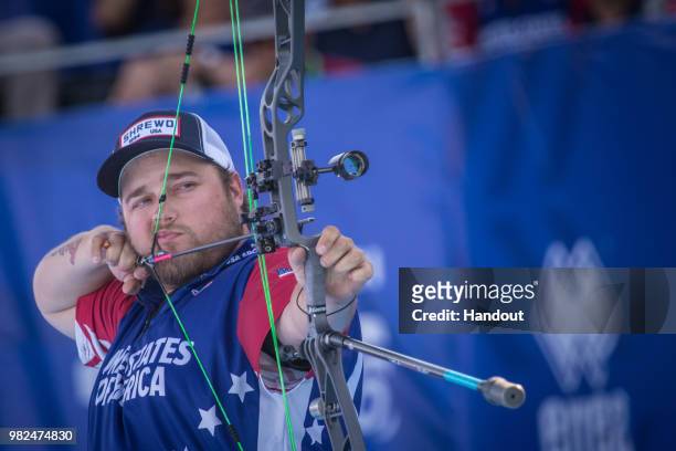 In this handout image provided by the World Archery Federation, Kris Schaff of USA during the compound mixed team finals during the Hyundai Archery...