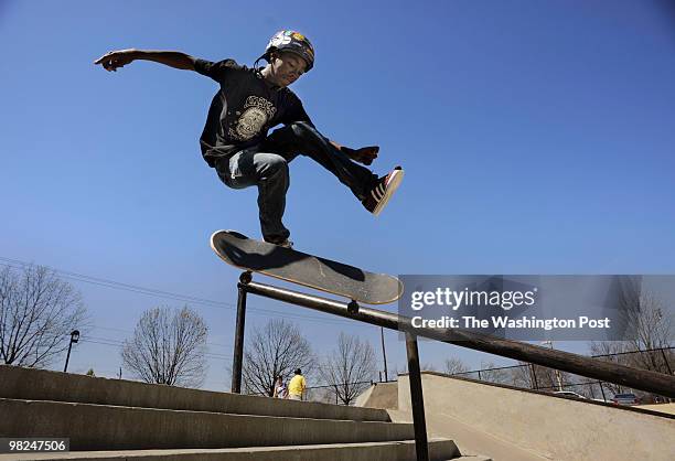 Alex Michell of Silver Spring, Maryland, practices a 360 flip on his skateboard at Olney Manor Skate Park on Friday, April 2, 2010. As area...