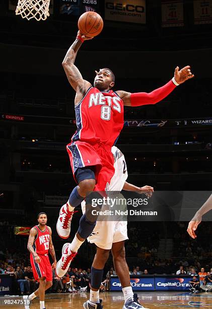 Terrence Williams of the New Jersey Nets shoots against James Singleton of the Washington Wizards at the Verizon Center on April 4, 2010 in...