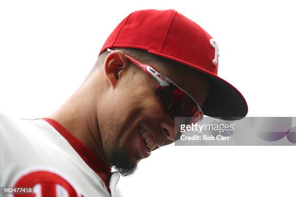 Aaron Altherr of the Philadelphia Phillies smiles while walking to the dugout before the start of the Phillies and Washington Nationals game at...