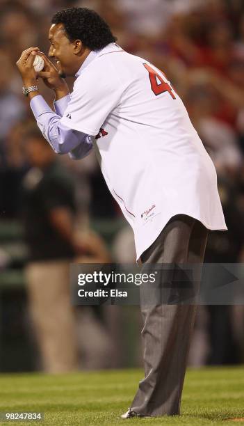 Former Boston Red Sox pitcher Pedro Martinez throws out the ceremonial first pitch before the game againt the New York Yankees on April 4, 2010...