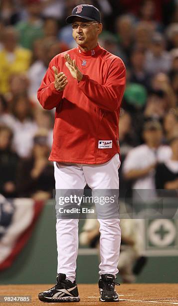 Manager Terry Francona of the Boston Red Sox stands on the field during player introductions before the game against the New York Yankees on April 4,...