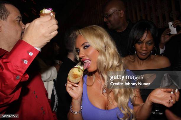 Ice-T, Coco, and Toya Bentson attend Coco's birthday party at the Hudson Eatery on April 3, 2010 in New York City.