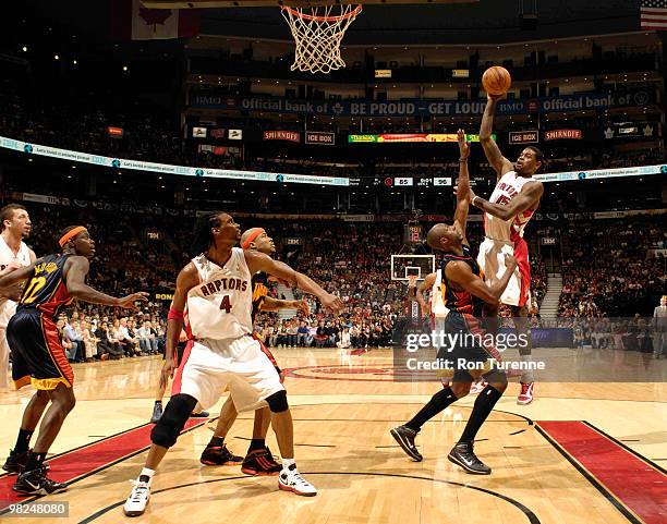 Amir Johnson of the Toronto Raptors attempts a hook-shot over Anthony Tolliver of the Golden State Warriors during a game on April 4, 2010 at the Air...