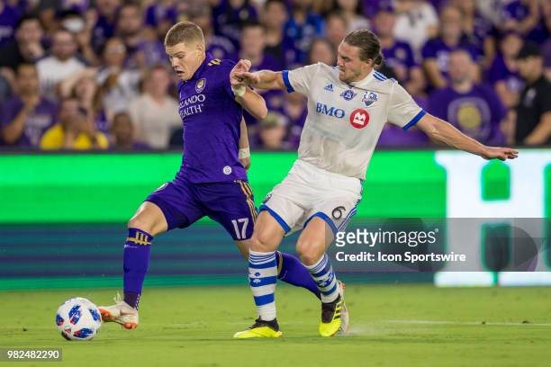 Orlando City forward Chris Mueller with the ball during the soccer match between the Orlando City Lions and the Montreal Impact on June 23, 2018 at...