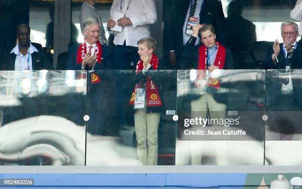 King Philippe of Belgium and his sons Prince Emmanuel of Belgium and Prince Gabriel of Belgium celebrate the victory of the Red Devils following the...