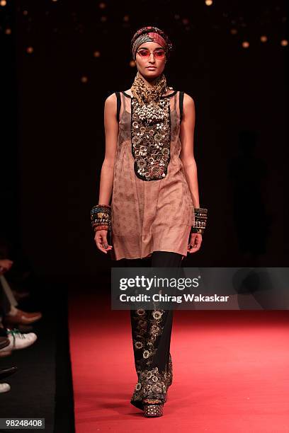 Model walks the runway in a Sabyasachi design at the Lakme India Fashion Week Day 1 held at Grand Hyatt Hotel on March 5, 2010 in Mumbai, India.