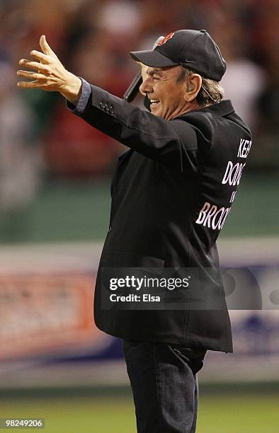 Neil Diamond sings his song "Sweet Caroline" in the eighth inning as the Boston Red Sox play the New York Yankees on April 4, 2010 during Opening...