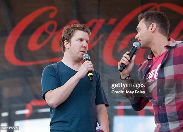 Ryan Seacrest talks with Nick Swardson onstage during day 2 of the free NCAA 2010 Big Dance Concert Series at White River State Park on April 3, 2010...