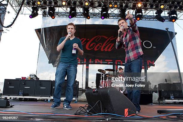 Ryan Seacrest talks with Nick Swardson onstage during day 2 of the free NCAA 2010 Big Dance Concert Series at White River State Park on April 3, 2010...