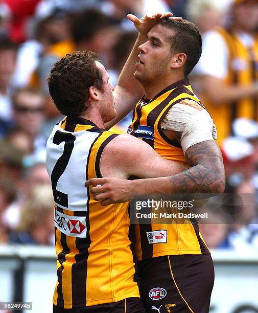 Jarryd Roughead of the Hawks celebrates a goal with Lance Franklin during the round two AFL match between the Hawthorn Hawks and the Geelong Cats at...