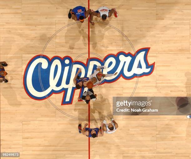 David Lee of the New York Knicks and Drew Gooden of the Los Angeles Clippers jump for the opening tip at Staples Center on April 4, 2010 in Los...