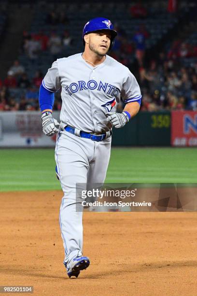 Toronto Blue Jays outfielder Steve Pearce rounds the bases on his game winning three run home run in the 9th inning during a MLB game between the...