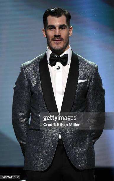 Brian Boyle of the New Jersey Devils stands onstage before the 2018 NHL Awards presented by Hulu at The Joint inside the Hard Rock Hotel & Casino on...