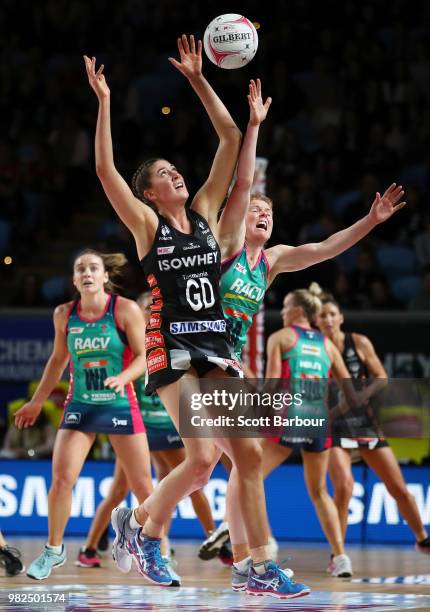 Matilda Garrett of the Magpies and Tegan Philip of the Vixens compete for the ball during the round eight Super Netball match between Magpies and the...