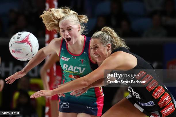 Erin Bell of the Magpies and Joanna Weston of the Vixens compete for the ball during the round eight Super Netball match between Magpies and the...