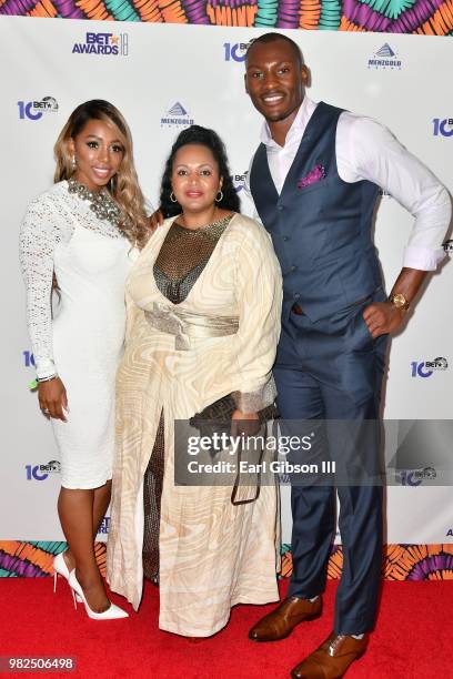 Ana Ledesma, Vice President, Programming & Brand Advancement - Viacom International Media Networks Ava L. Hall, and Bismack Biyombo attend the BETX...