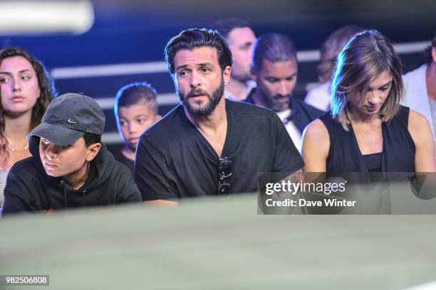 French singer Maxime Nucci , his son Aaron Nucci and partner, French journalist and tv presenter Isabelle Ithurburu , during La Conquete Acte 5...