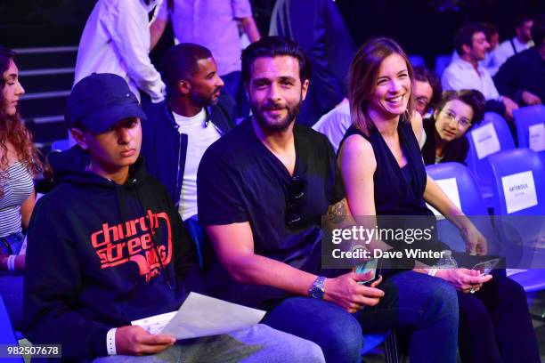 French singer Maxime Nucci , his son Aaron Nucci and partner, French journalist and tv presenter Isabelle Ithurburu , during La Conquete Acte 5...