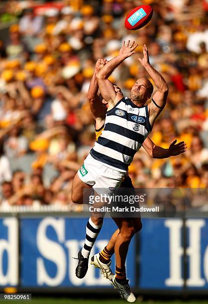 Paul Chapman of the Cats flies for a mark during the round two AFL match between the Hawthorn Hawks and the Geelong Cats at Melbourne Cricket Ground...