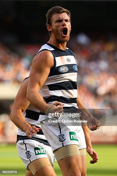 Cameron Mooney of the Cats celebrates a goal during the round two AFL match between the Hawthorn Hawks and the Geelong Cats at Melbourne Cricket...