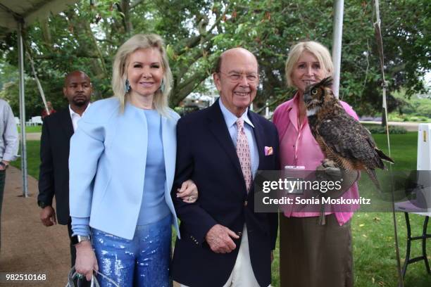 Hilary Geary Ross, Wilbur Ross, and Jane Gill attend the 12th Annual Get Wild! Summer Benefit on June 23, 2018 in Southampton, New York.