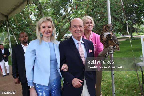 Hilary Geary Ross, Wilbur Ross, and Jane Gill attend the 12th Annual Get Wild! Summer Benefit on June 23, 2018 in Southampton, New York.