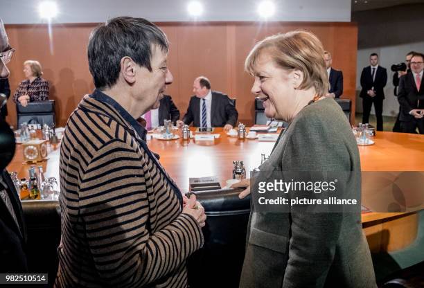 Dpatop - German chancellor Angela Merkel speaks to minister of the environment Barbara Hendricks at the federal chancellery in Berlin, Germany, 31...
