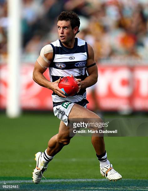 Shannon Byrnes of the Cats looks for a teammate during the round two AFL match between the Hawthorn Hawks and the Geelong Cats at Melbourne Cricket...