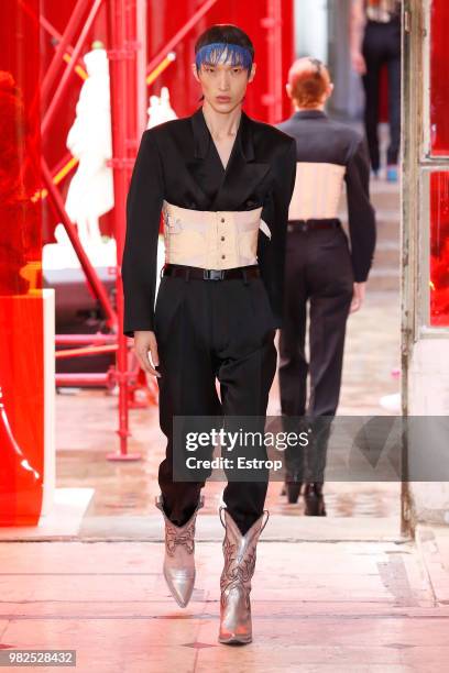 Model walks the runway during the Maison Margiela Menswear Spring/Summer 2019 show as part of Paris Fashion Week on June 22, 2018 in Paris, France.