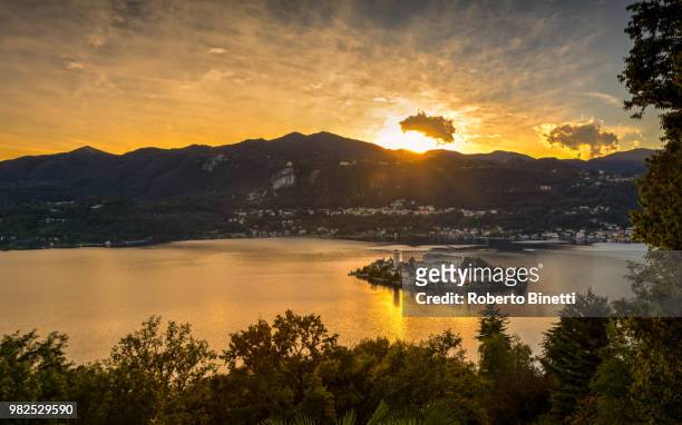 san giulio island sunset - binetti stock pictures, royalty-free photos & images