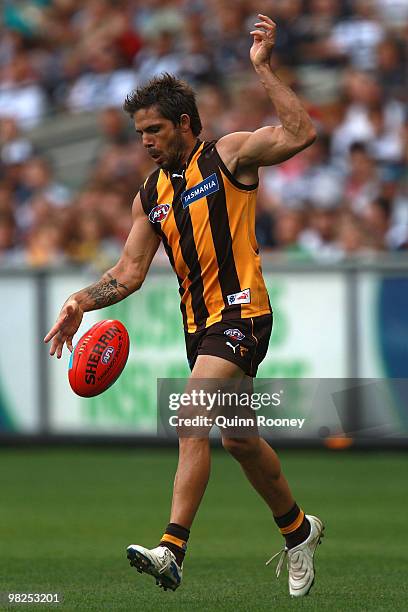 Chance Bateman of the Hawks kicks during the round two AFL match between the Hawthorn Hawks and the Geelong Cats at Melbourne Cricket Ground on April...