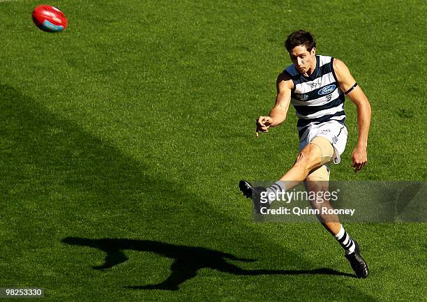 Harry Taylor of the Cats kicks during the round two AFL match between the Hawthorn Hawks and the Geelong Cats at Melbourne Cricket Ground on April 5,...