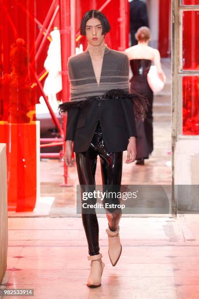Model walks the runway during the Maison Margiela Menswear Spring/Summer 2019 show as part of Paris Fashion Week on June 22, 2018 in Paris, France.