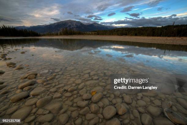 athabasca river rocks - athabasca river stock pictures, royalty-free photos & images