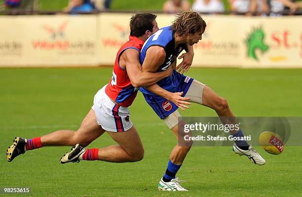 Brayden Duckworth of West Perth tackles Hamish Shepheard of East Perth during the round three WAFL match between East Perth and West Perth at...