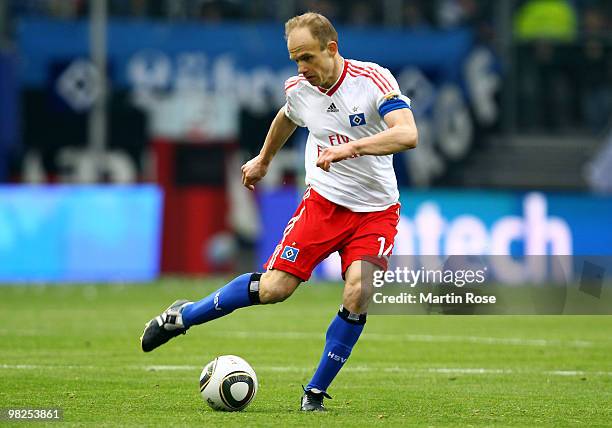 David Jarolim of Hamburg runs with the ball during the Bundesliga match between Hamburger SV and Hannover 96 at HSH Nordbank Arena on April 4, 2010...