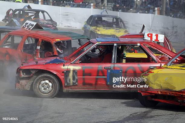 Cars collide as they compete in one of the 2-litre National Bangers Heat races at the United Downs Raceway banger racing meet in St Day near Redruth...