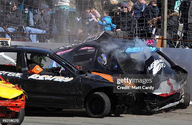 Cars collide as they compete in one of the 2-litre National Bangers Heat races at the United Downs Raceway banger racing meet in St Day near Redruth...