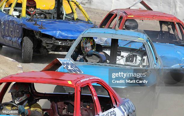 Cars compete in the 2-litre National Bangers Heat race at the United Downs Raceway banger racing meet in St Day near Redruth on April 4, 2010 in...