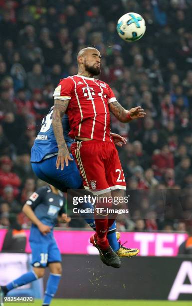 Mark Uth of Hoffenheim and Arturo Vidal of Muenchen battle for the ball during the Bundesliga match between FC Bayern Muenchen and TSG 1899...